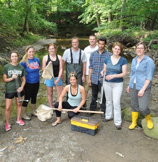Biology students monitoring water quality in Euclid Creek